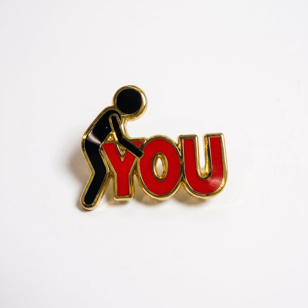 F*ck You enamel pin, a black stick figure getting busy with the big red letters YOU, outlined in gold