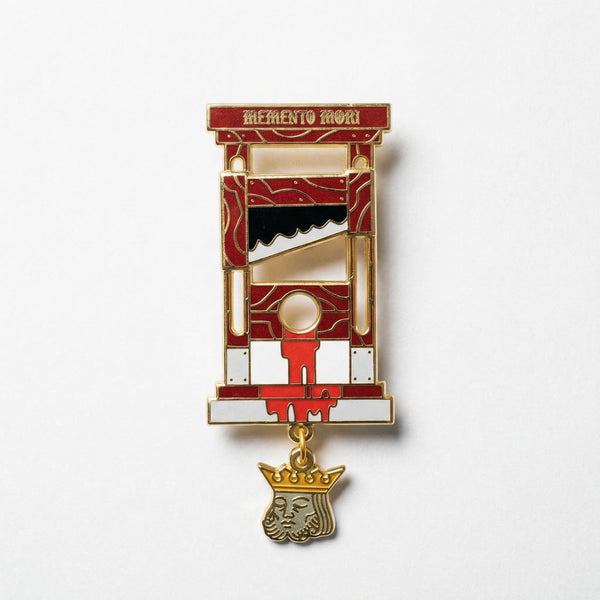 Guillotine enamel pin with sliding blade and dangling king head charm