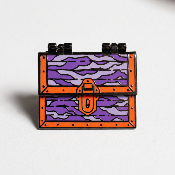 Purple and orange mimic treasure chest enamel pin with hinged lid