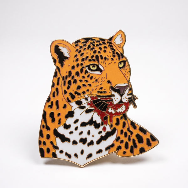 Bloody Leopard enamel pin, a snarling leopard head with blood on its mouth