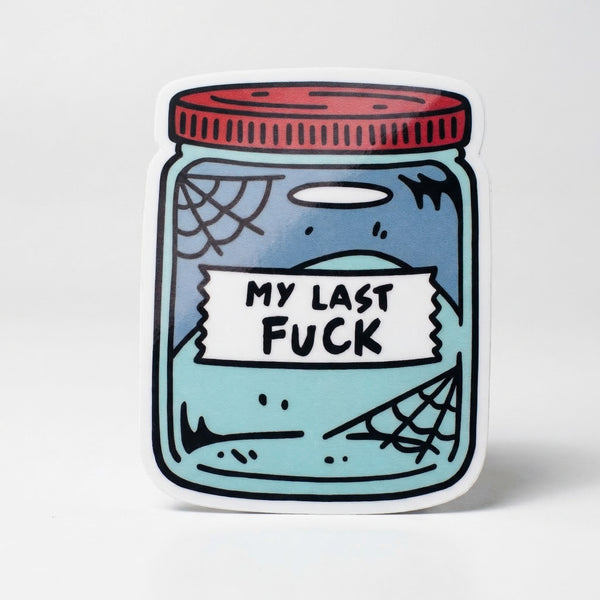 A die-cut vinyl sticker of a jar with a red lid and cobwebs inside, labeled My Last Fuck.