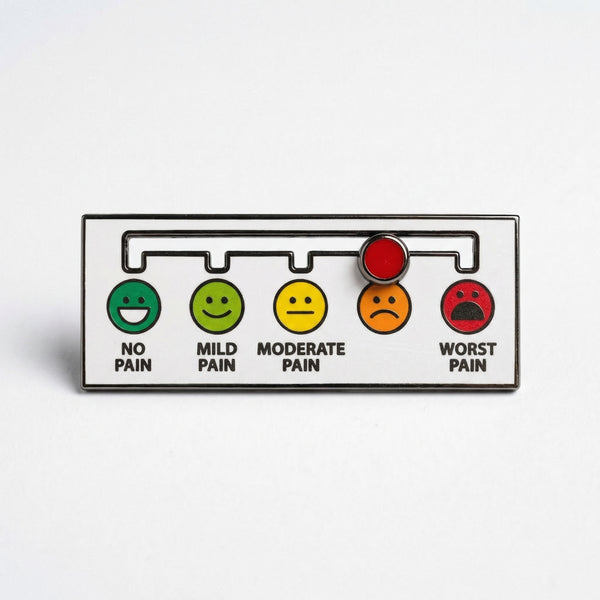 Pain scale enamel pin with a functional sliding red marker.