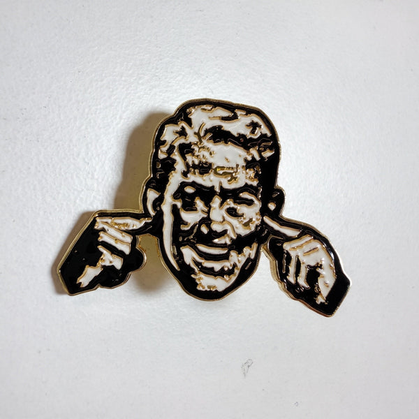 Head Squeeze enamel pin