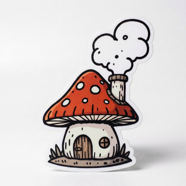 Die-cut sticker of a red mushroom house with smoke coming from a chimney