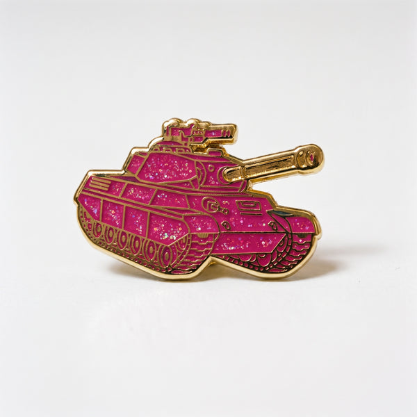 Pink Glitter Tank enamel pin, a battle tank filled with hot pink glitter enamel and gold outlines