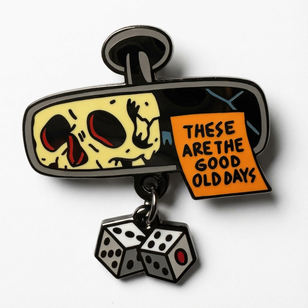 Good Old Days enamel pin, a rearview mirror with a skull reflection and hanging dice, on a white background