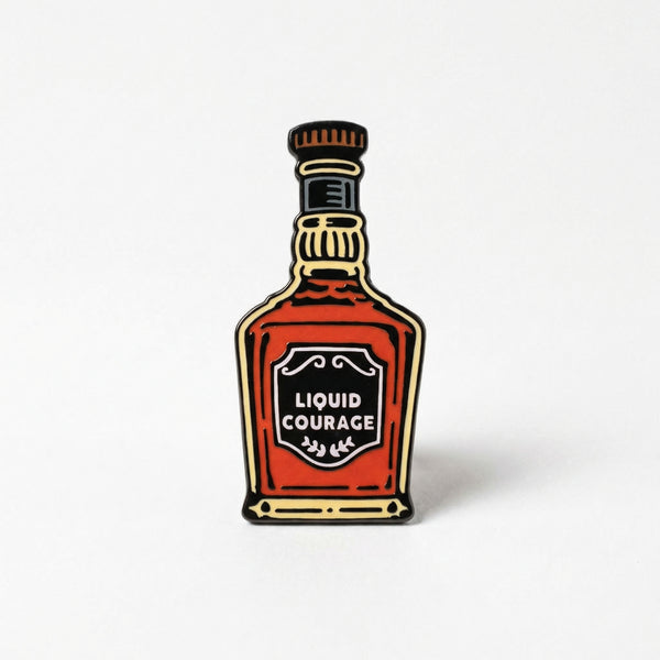 Enamel pin of a whiskey bottle with Liquid Courage label